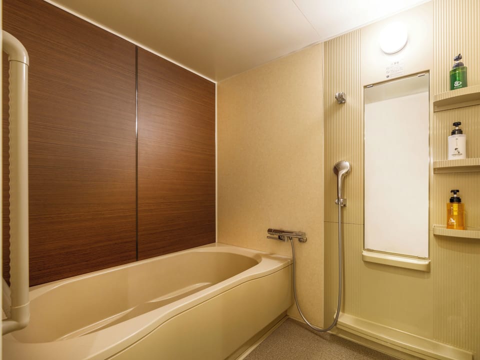 Western-style twin room (with bath) "Suigetsu no Sho" | Bathroom | Hair dryer, slippers, bidet, towels