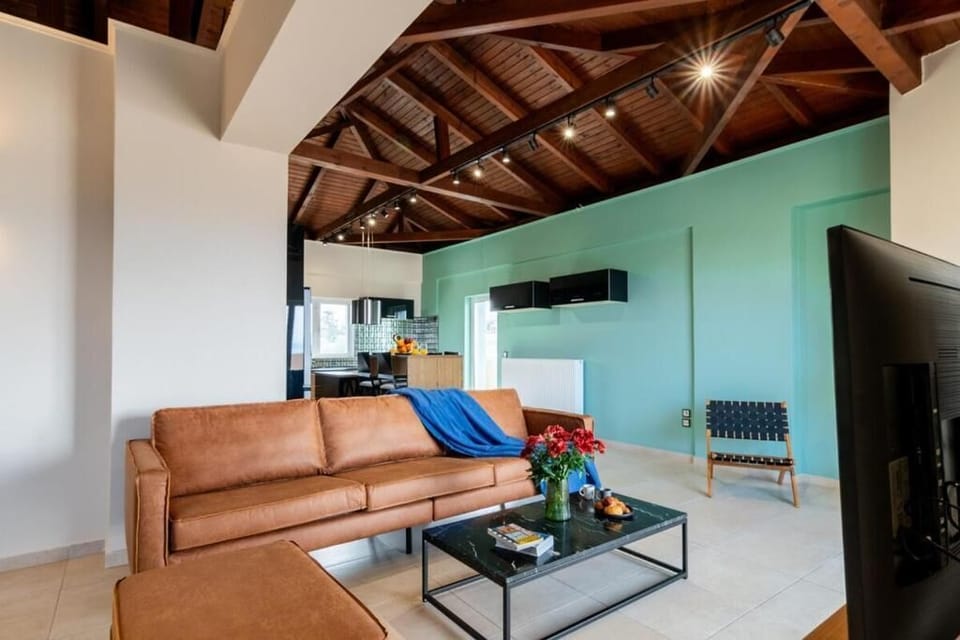 Apartment, Balcony, Sea View | Living area | 50-inch Smart TV with satellite channels, Netflix, streaming services