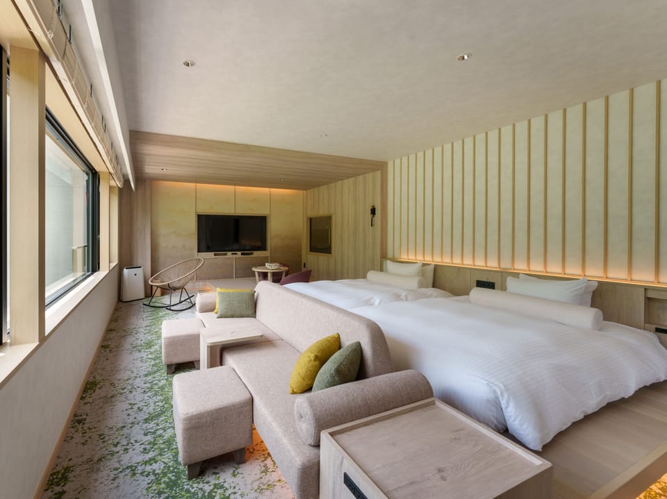 Family Quadruple Room, Non Smoking, River View | Down comforters, in-room safe, desk, free WiFi