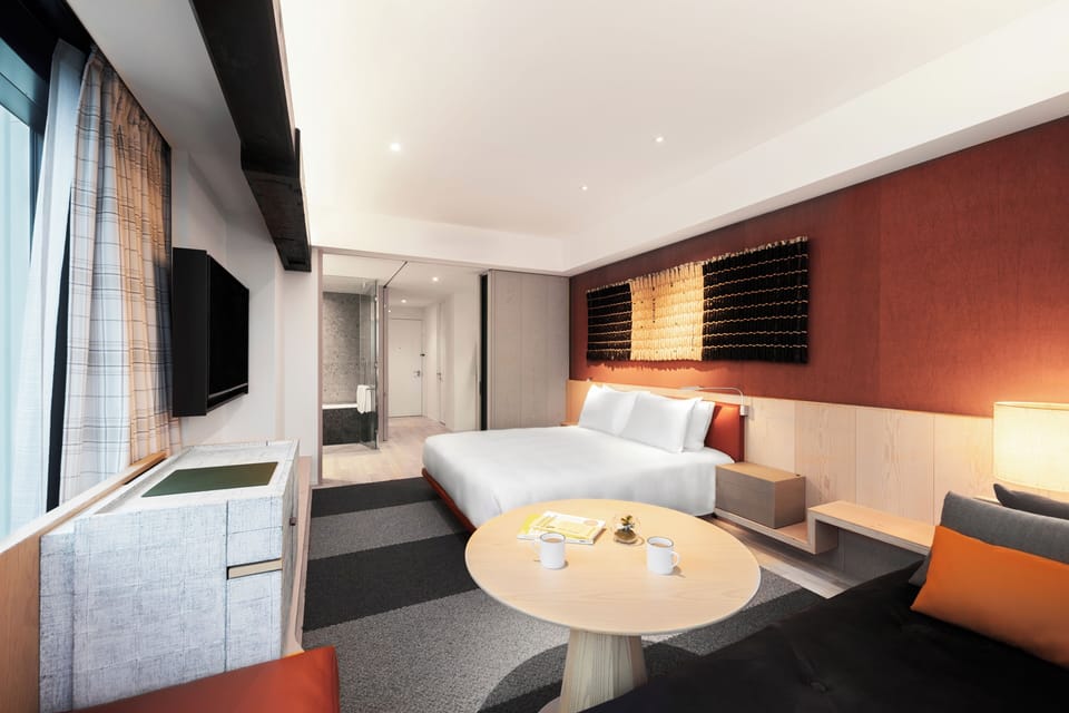Deluxe Room, 1 King Bed with Sofa bed | Minibar, in-room safe, desk, blackout drapes