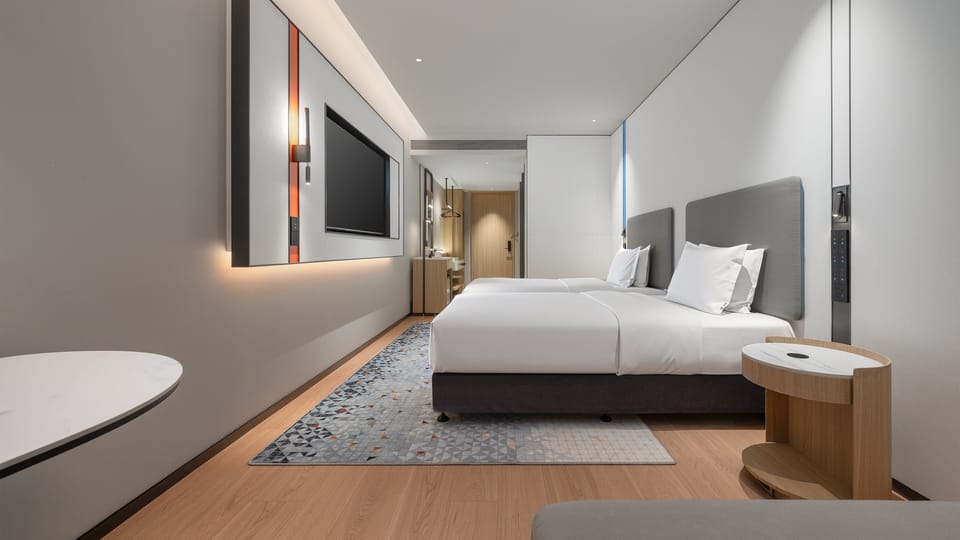 2 Single Standard City View | Down comforters, desk, blackout drapes, soundproofing