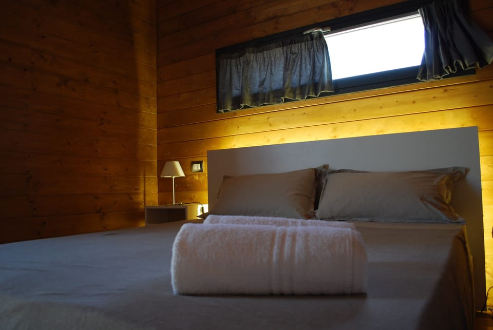 Deluxe Bungalow, River View | Down comforters, minibar, blackout drapes, soundproofing