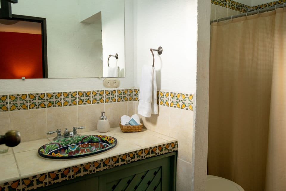 Basic Double Room, Multiple Beds | Bathroom | Free toiletries, hair dryer, towels