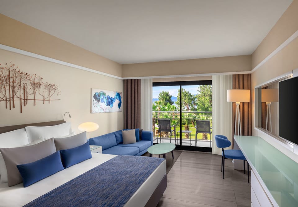 Standard Room, Sea View (Adult) | Free minibar, in-room safe, desk, iron/ironing board