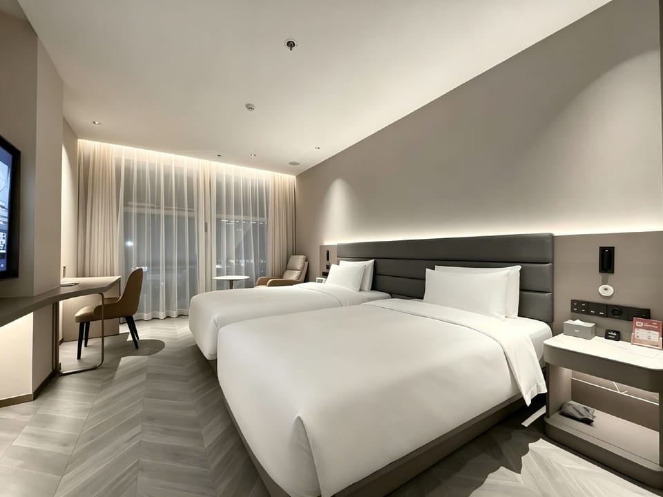 Executive Twin Room | Desk, blackout drapes, iron/ironing board, free WiFi