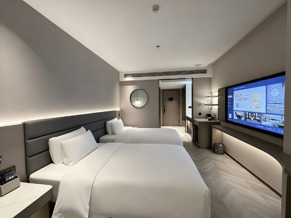 Executive Twin Room | Desk, blackout drapes, iron/ironing board, free WiFi