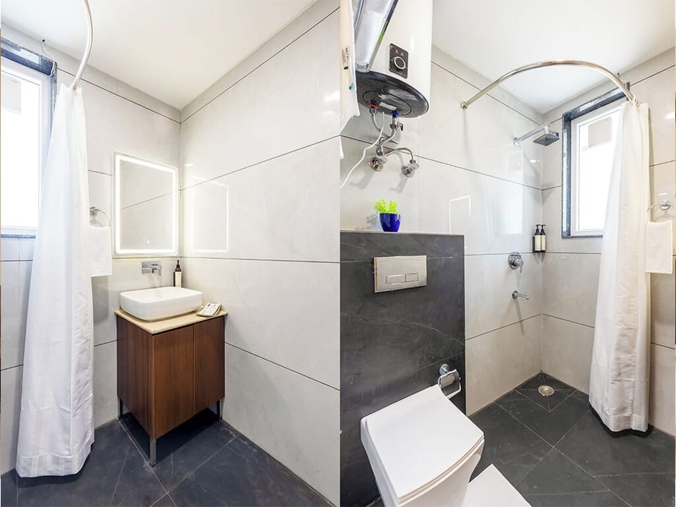 Deluxe Double Room, Private Bathroom, City View | Bathroom | Shower, free toiletries, hair dryer, slippers