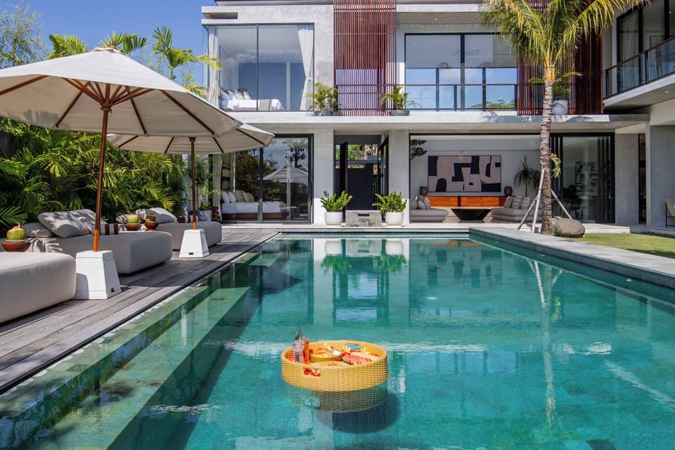 Outdoor pool, pool umbrellas, sun loungers