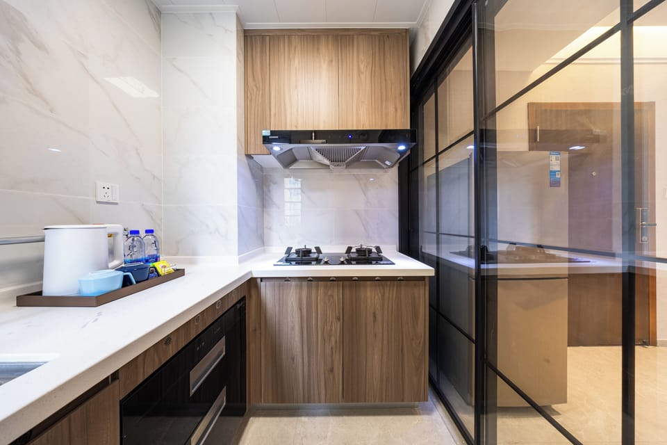 Standard Suite, Balcony, Garden View | Private kitchen | Fridge