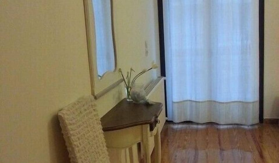 Deluxe Apartment, 3 Bedrooms | Living area | TV, fireplace