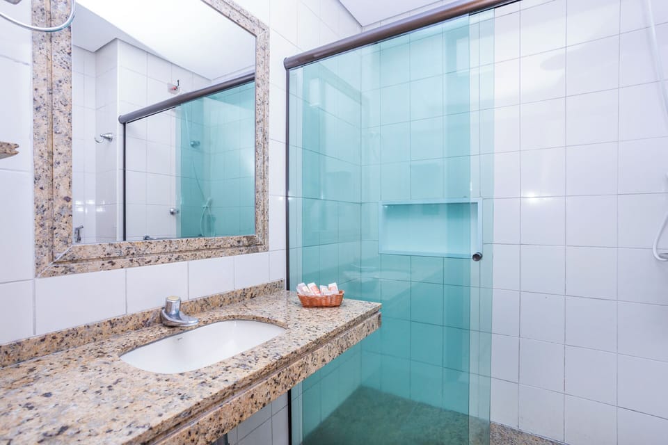 Semi-Luxury PCD | Bathroom | Shower, hair dryer, towels, soap