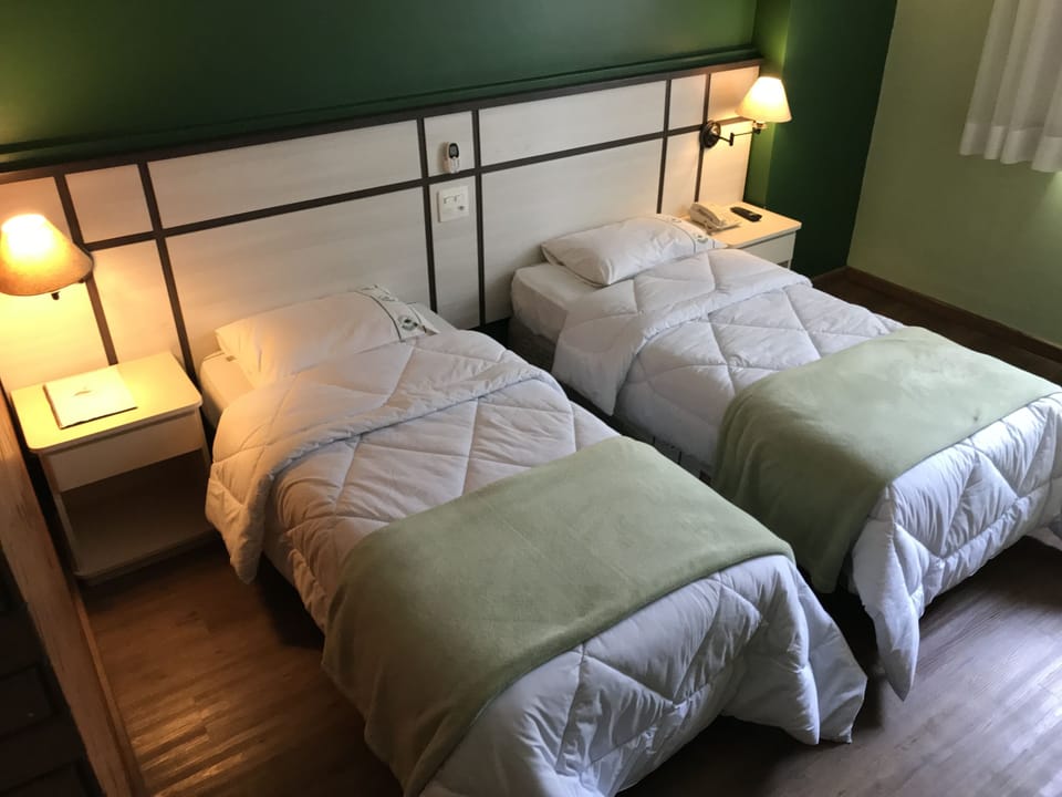 Minibar, desk, blackout drapes, iron/ironing board