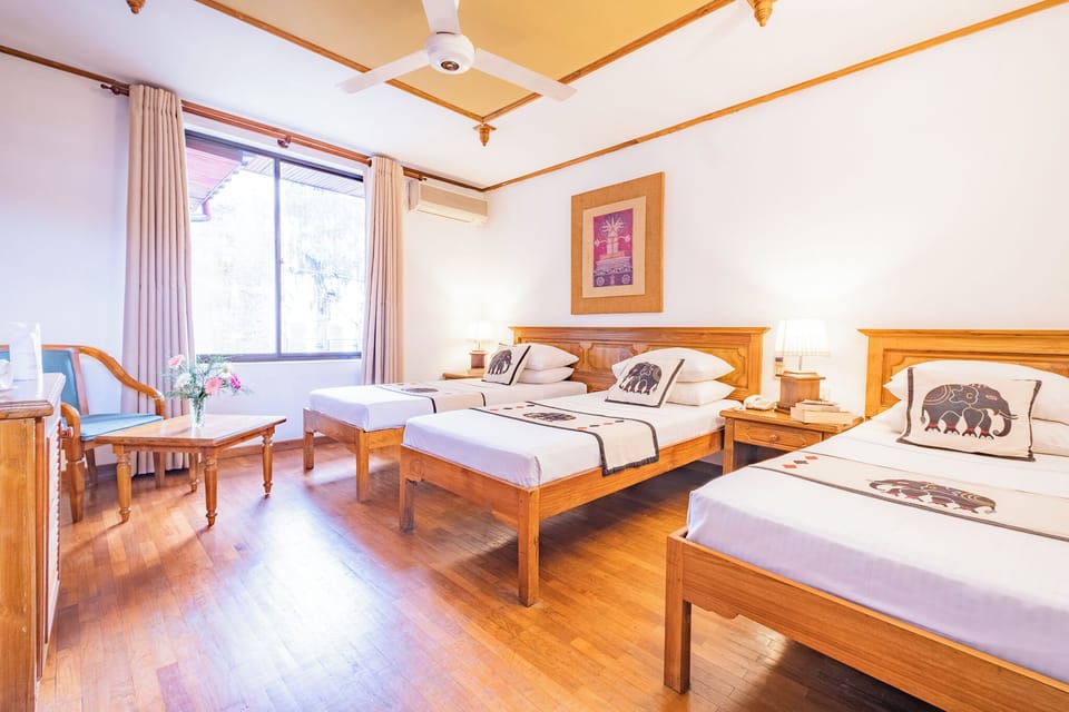 Deluxe Triple Room | Premium bedding, minibar, in-room safe, desk