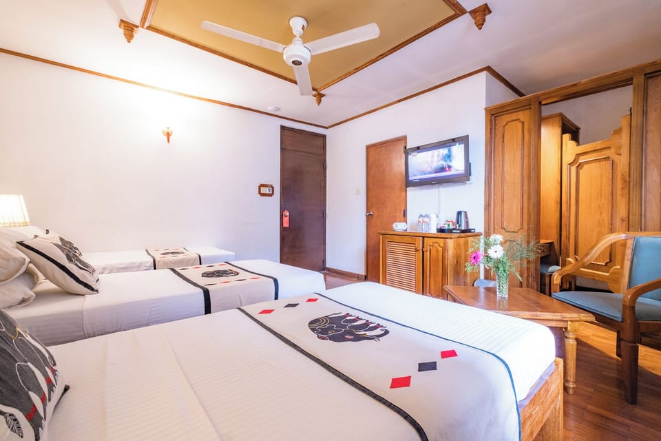 Deluxe Triple Room | Premium bedding, minibar, in-room safe, desk