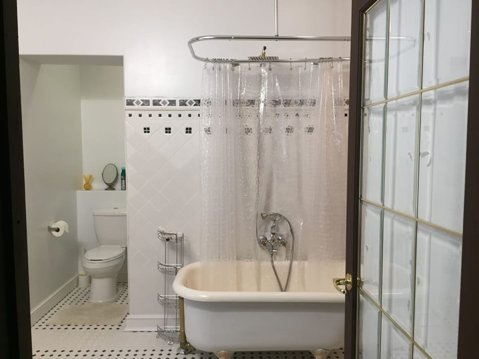 Luxury Suite, 1 King Bed (Gardens of Babylon) | Bathroom | Rainfall showerhead, designer toiletries, hair dryer, towels