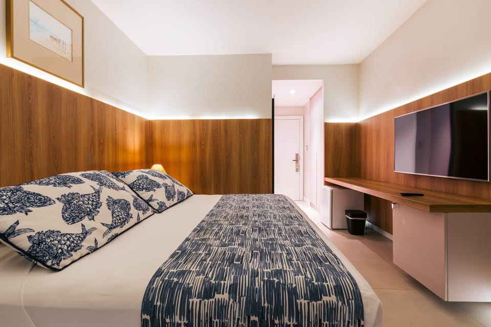 Apartamento Standard | Minibar, blackout drapes, free WiFi