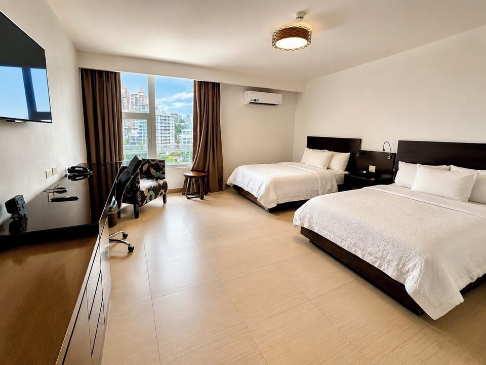 Deluxe Twin Room, City View | In-room safe, desk, soundproofing, iron/ironing board
