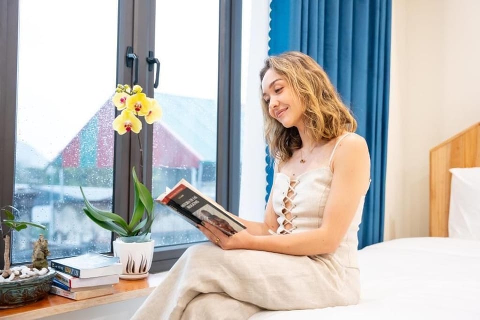 Deluxe Triple Room, Balcony, City View | Desk, blackout drapes, soundproofing, free WiFi