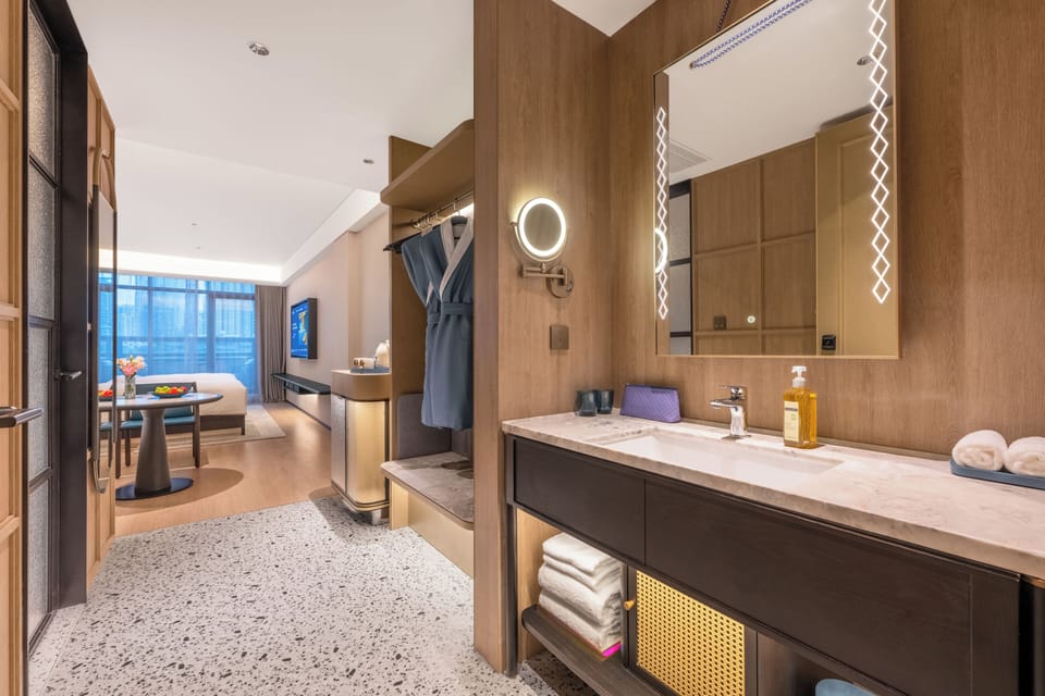 Panoramic Single Room, Patio, River View | Bathroom | Separate tub and shower, free toiletries, hair dryer, slippers