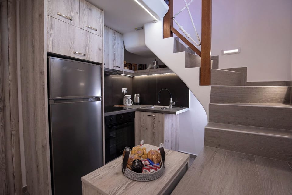 Apartment, Sea View | Private kitchen | Espresso maker, full-size fridge, oven, stovetop