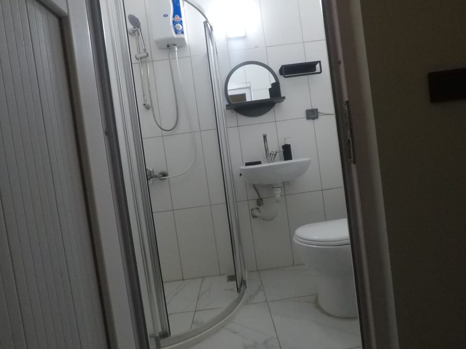 Standard Double Room, Balcony, Garden View | Bathroom | Shower, bathrobes, towels, toilet paper