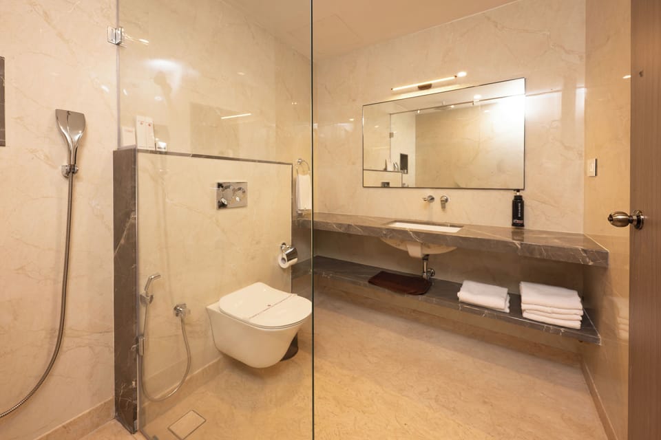 Shower, slippers, towels, soap