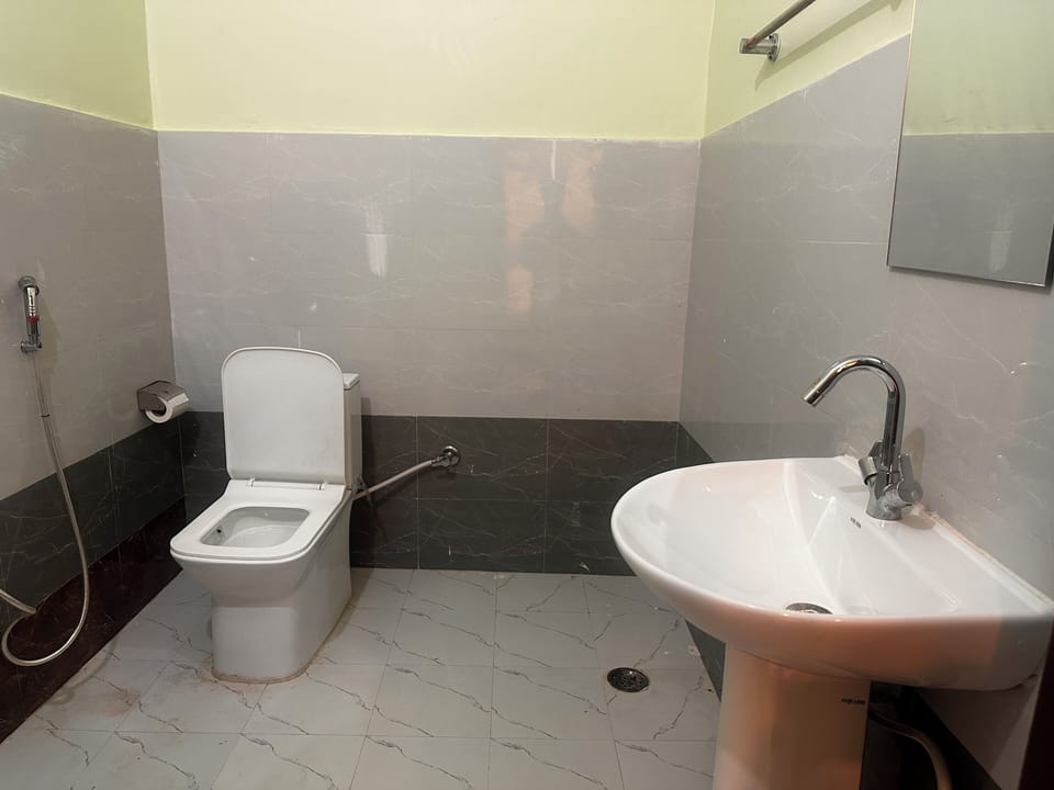 Basic Double Room | Bathroom | Shower, free toiletries, towels, soap