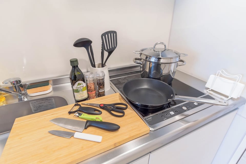 Standard Apartment, Lanai, City View | Private kitchen | Full-size fridge, microwave, stovetop, cookware/dishes/utensils
