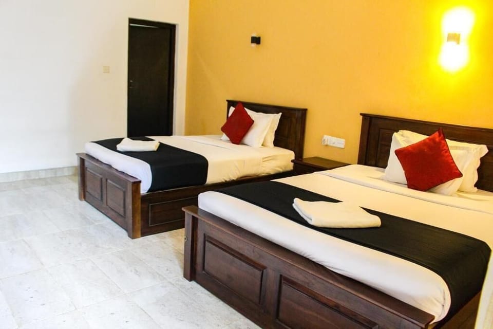 Deluxe Triple Room, Balcony | Iron/ironing board, free WiFi