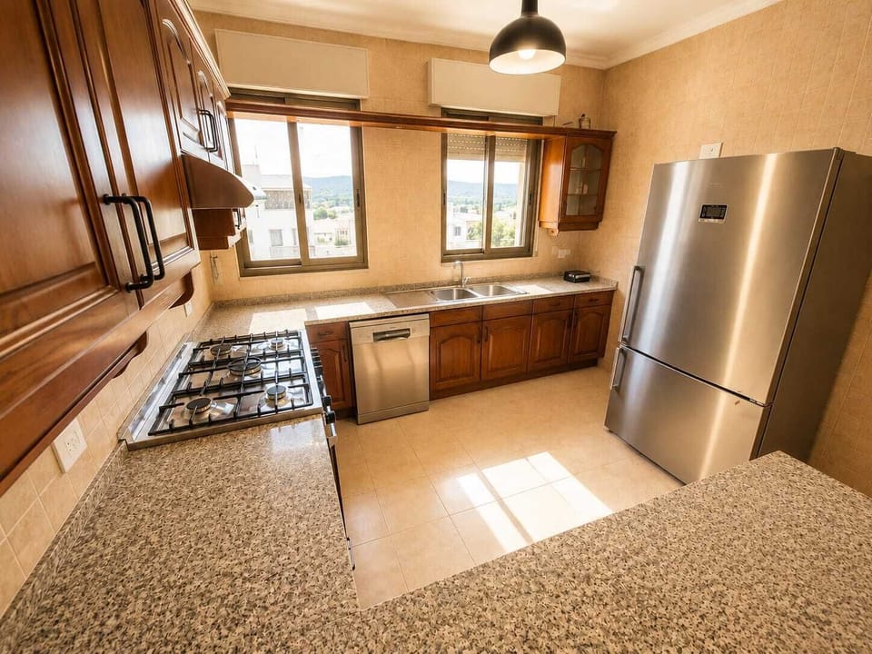 Apartment | Private kitchen | Cookware/dishes/utensils, freezer, dining table