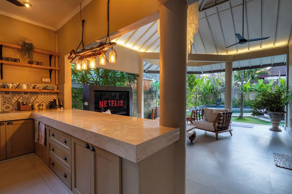 Villa | Private kitchen | Dining tables
