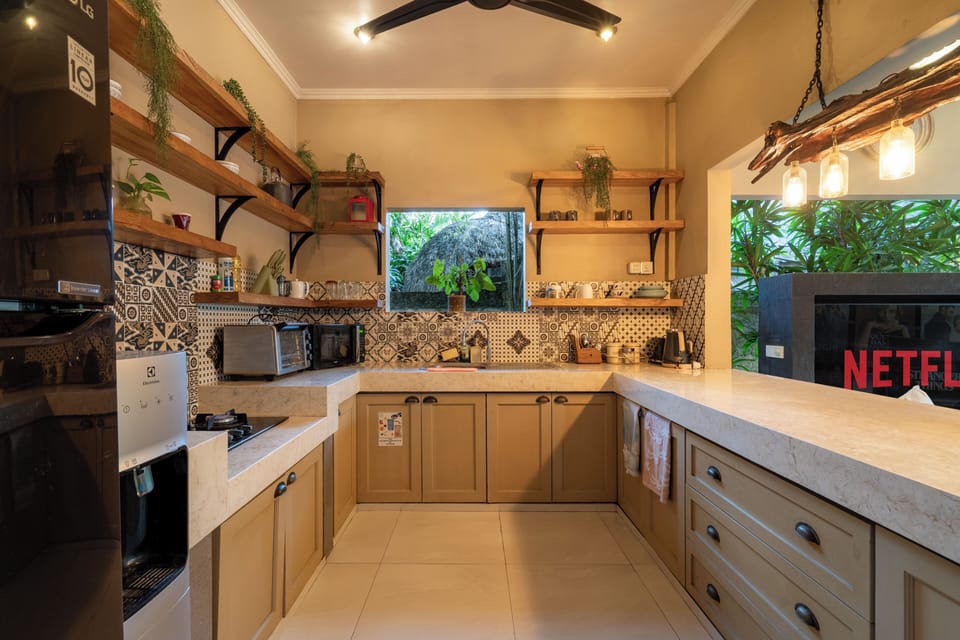 Villa | Private kitchen | Dining tables