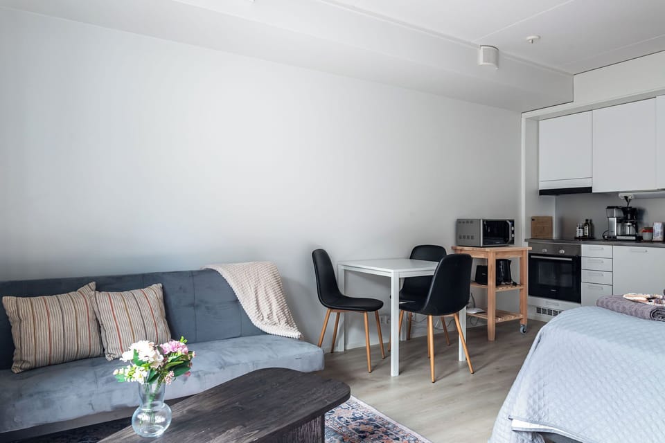 Superior Studio, City View | Living area | 42-cm flat-screen TV with cable channels