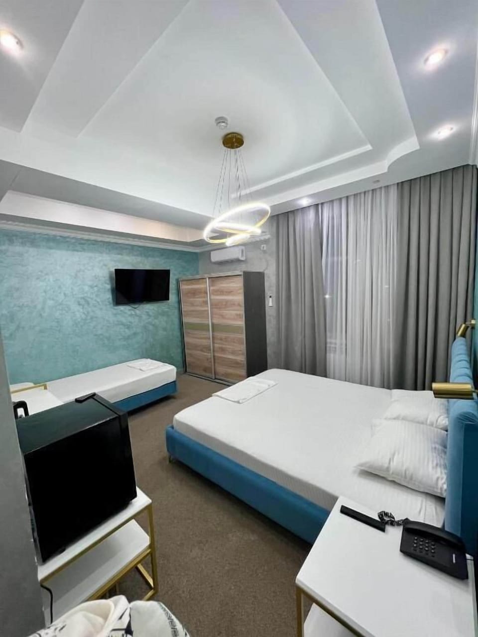Blackout drapes, soundproofing, iron/ironing board (on request)
