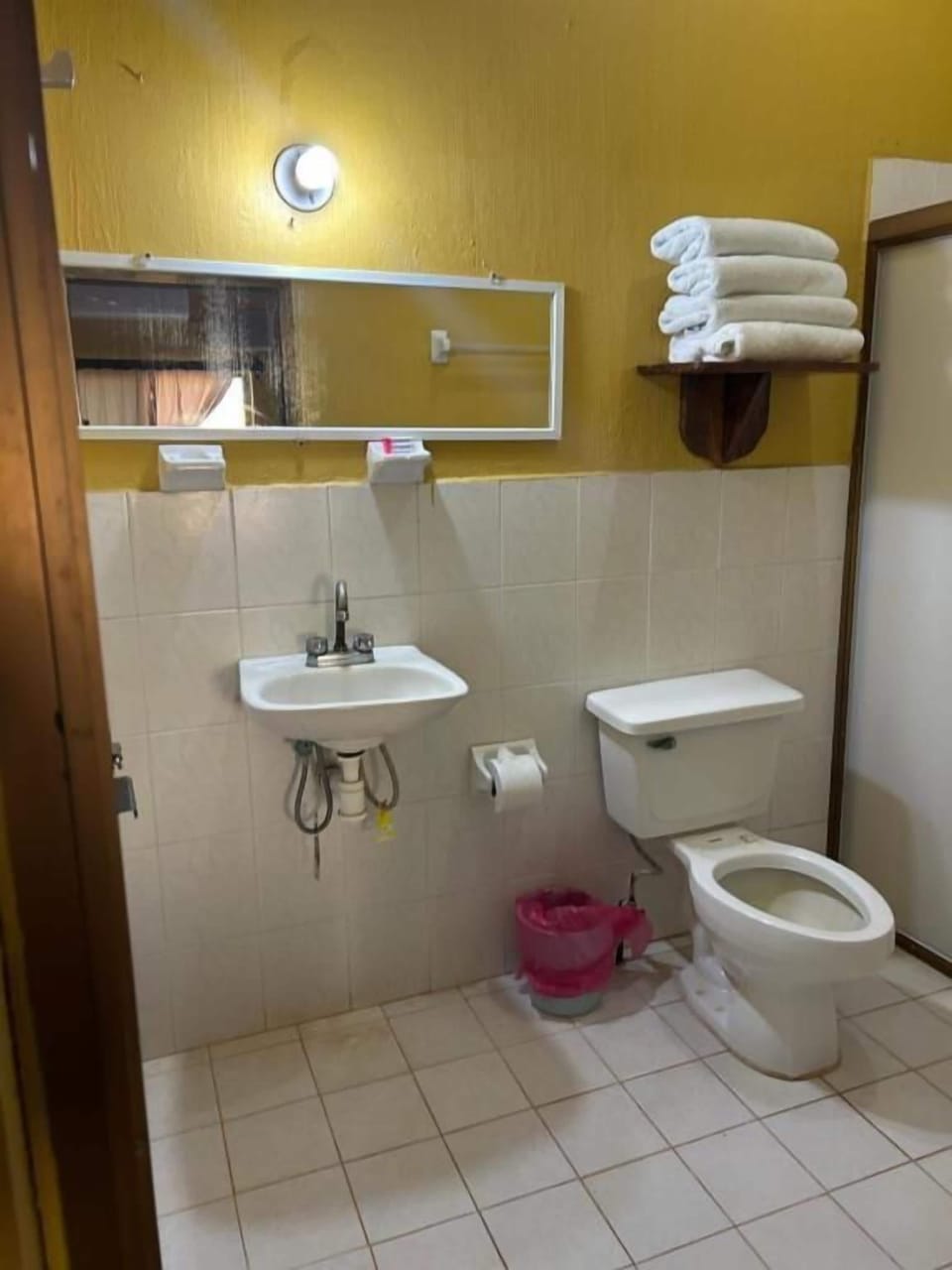 Shower, towels, soap, toilet paper