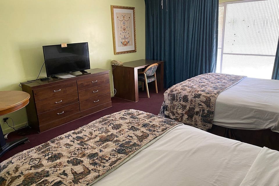 Basic Double Room, Patio, Pool View | Desk, laptop workspace, iron/ironing board (on request), WiFi (free)