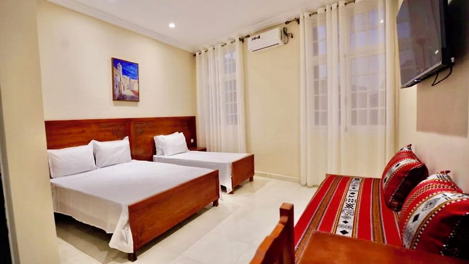 Standard Double or Twin Room | Desk, laptop workspace, blackout drapes, WiFi (free)