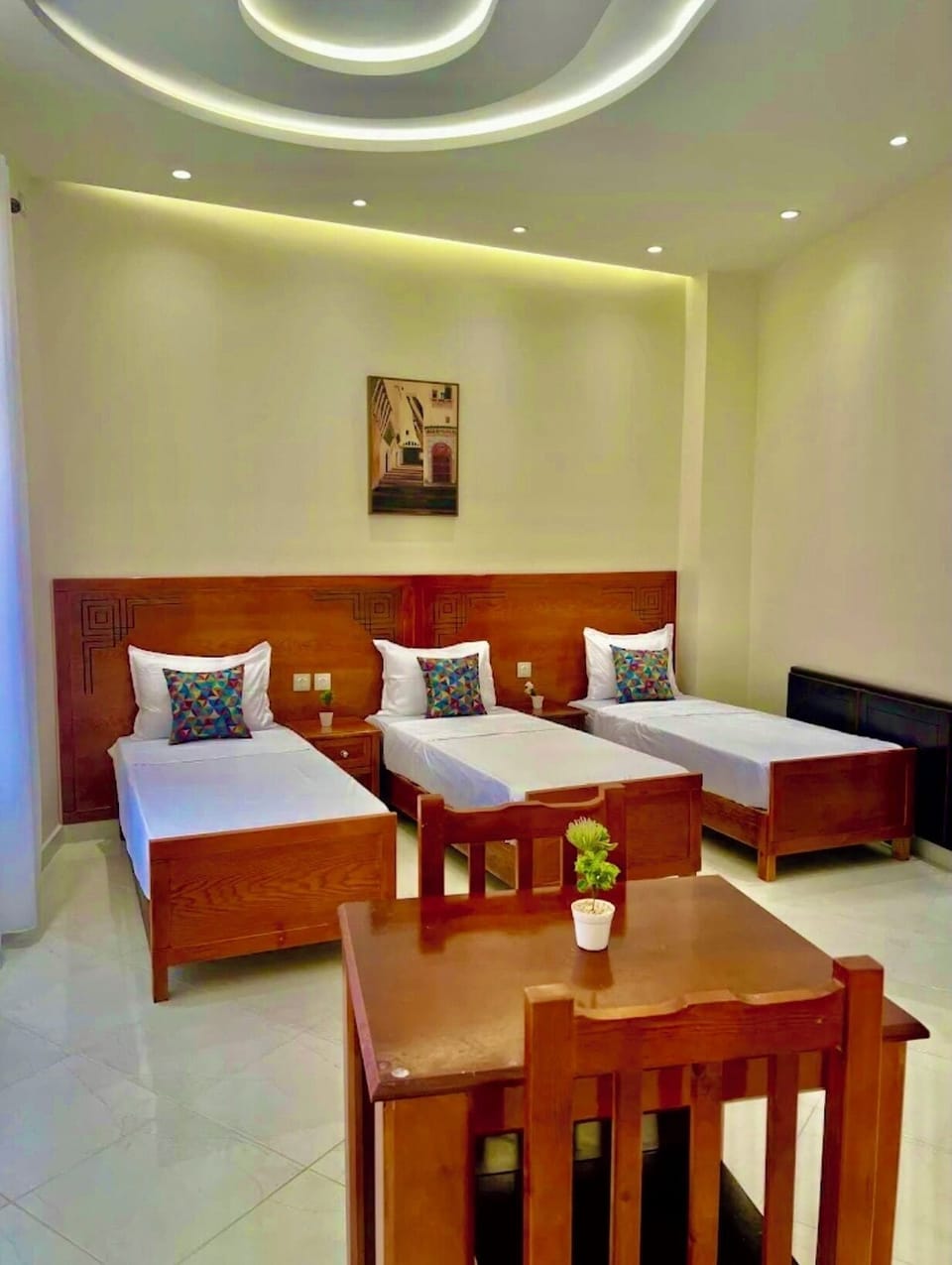 Triple Room | Desk, laptop workspace, blackout drapes, WiFi (free)