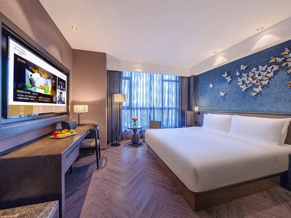 Business Double Room, Partial Ocean View | Down comforters, in-room safe, desk, laptop workspace