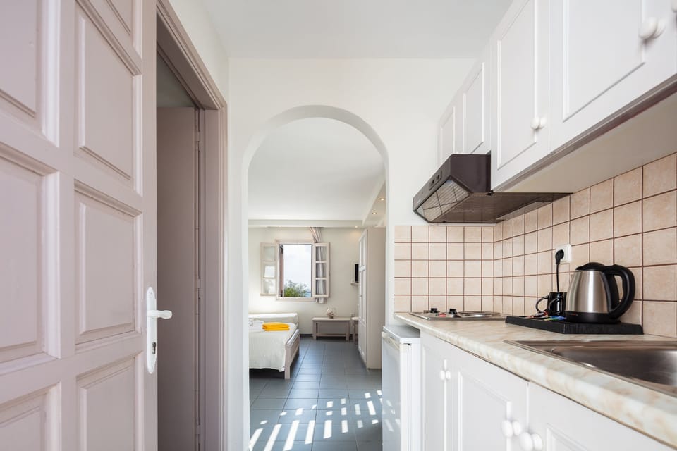 Aegean Quadruple Room with Terrace & Sea View | In-room safe, free WiFi, bed sheets