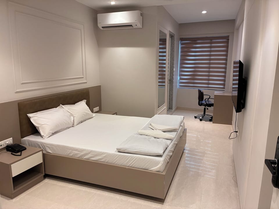 Standard Double Room, City View | Desk, laptop workspace, blackout drapes, soundproofing
