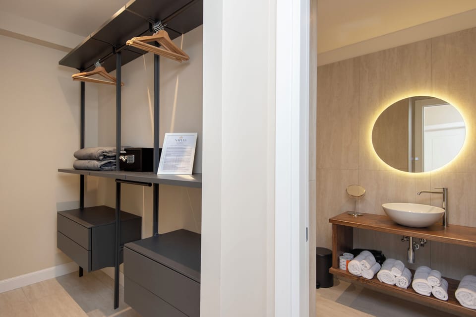 Luxury Quadruple Room, City View | Wardrobe