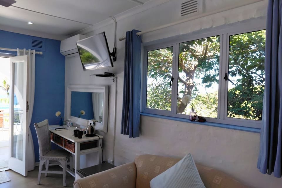 Superior Double or Twin Room, Sea View | Television