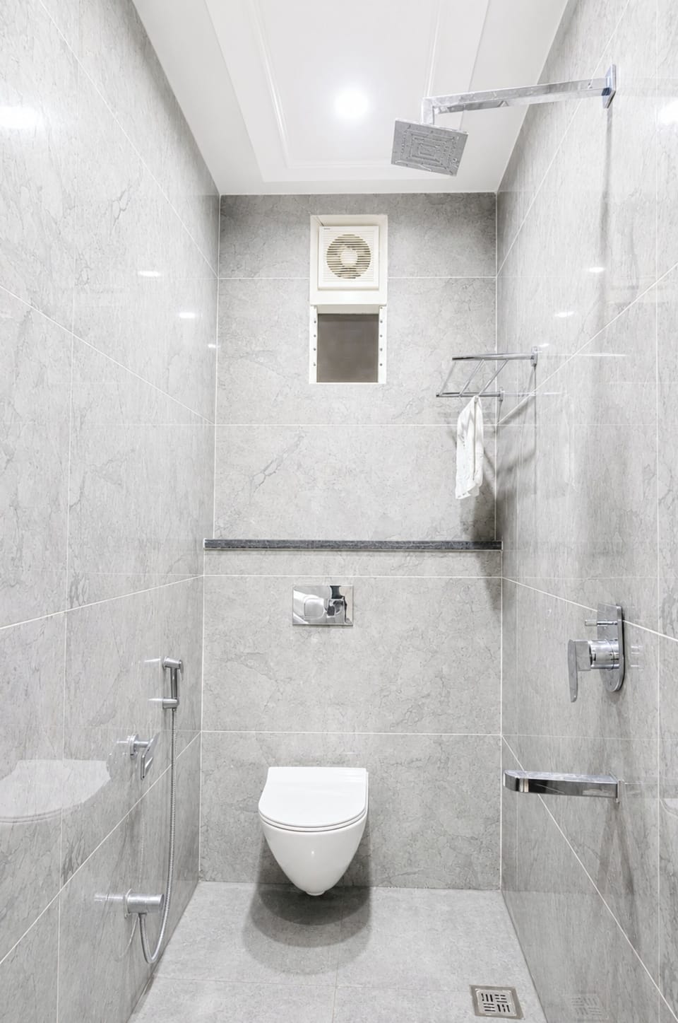 Shower, rainfall showerhead, slippers, towels
