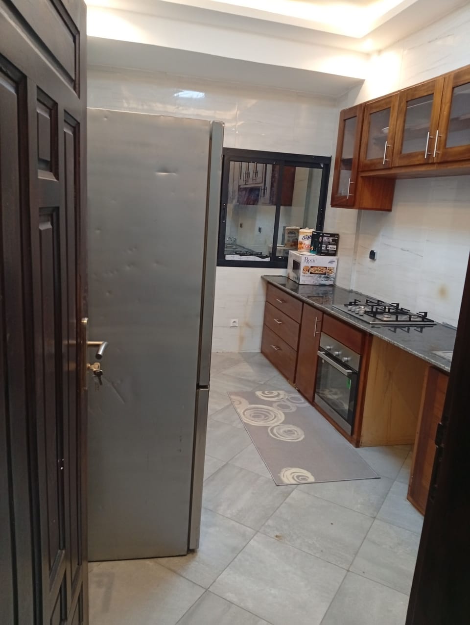 Deluxe Penthouse, Kitchen, City View | Private kitchen | Full-size fridge, microwave, oven, stovetop