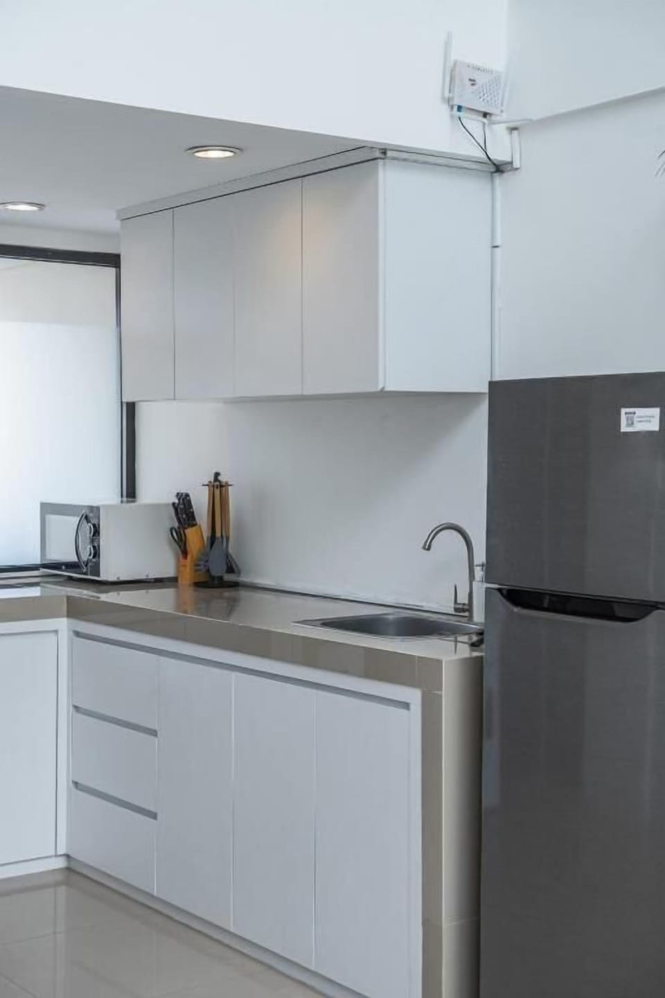 Townhome, Balcony, Courtyard View | Private kitchen | Fridge, microwave, oven, stovetop