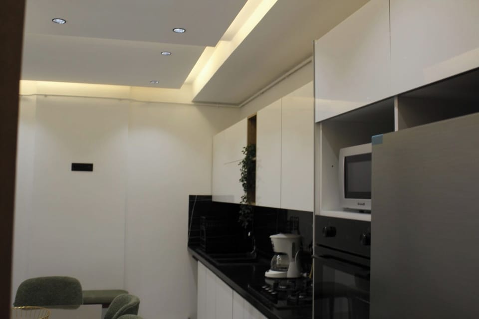 Fridge, microwave, oven, cookware/dishes/utensils