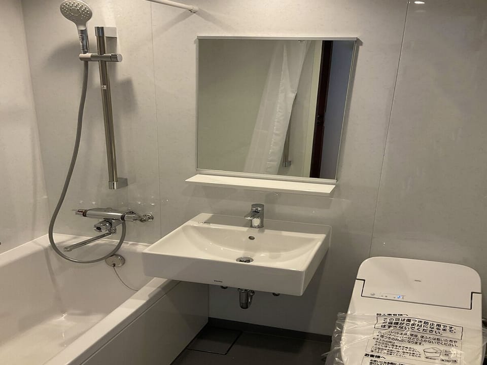 Shower, free toiletries, hair dryer (on request), slippers