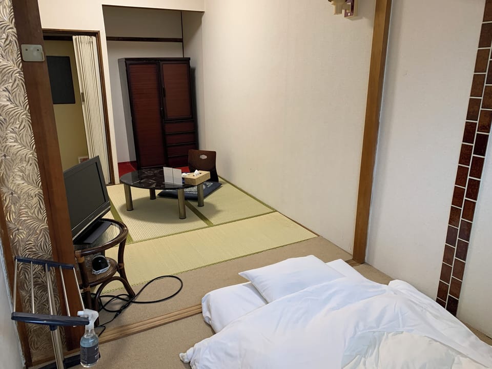 Japanese Style Twin Room with Shared Bathroom | Bed sheets