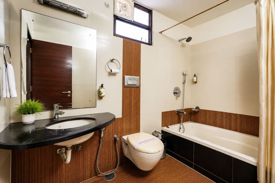 Superior Room, City View | Bathroom | Shower, towels, soap, shampoo